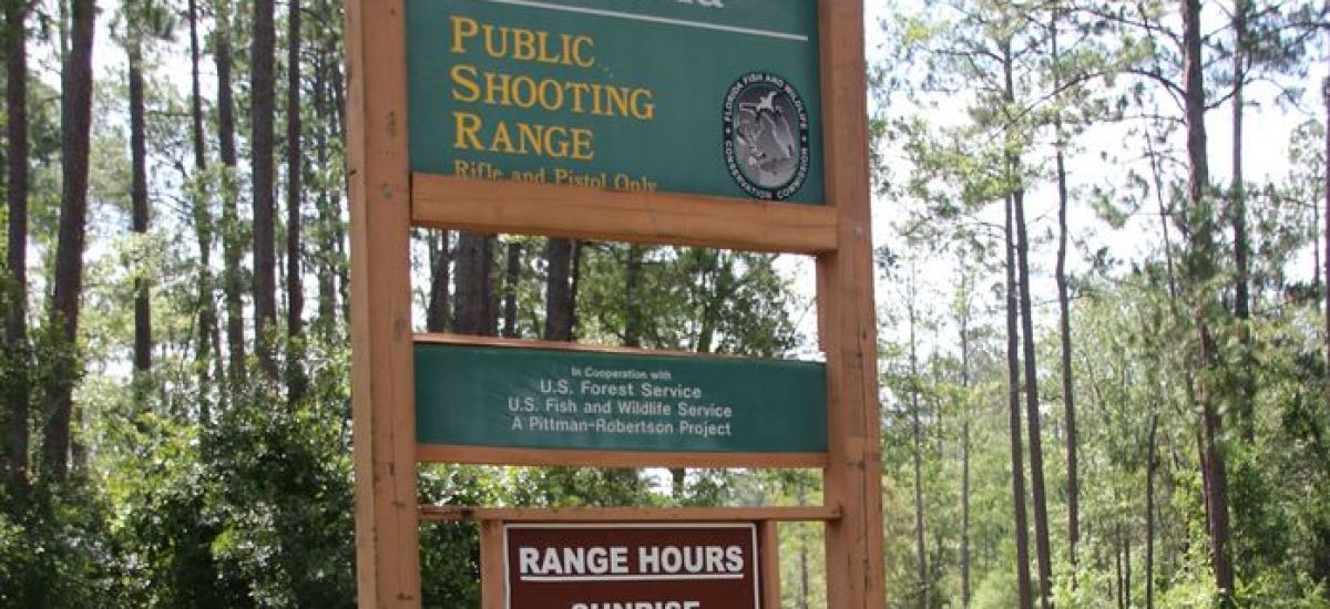 |person practicing at shooting range|