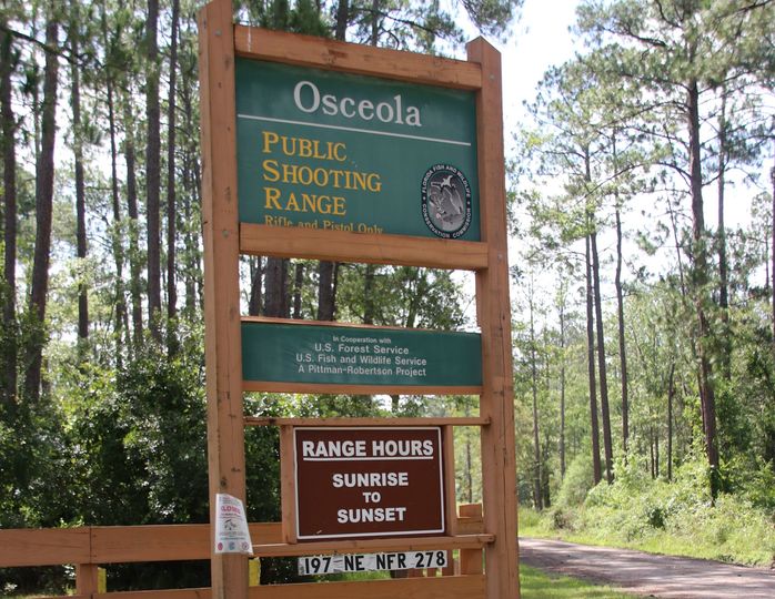 |person practicing at shooting range|