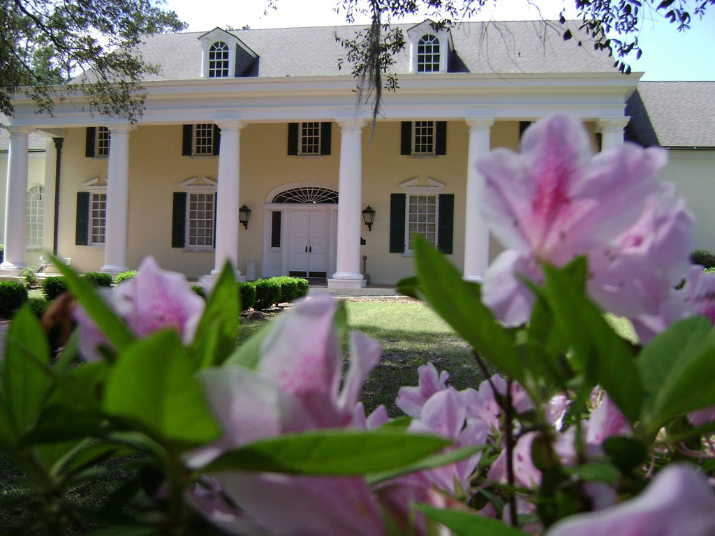 Stephen Foster Folk Culture Center|exterior of Stephen Foster Folk Culture Center State Park|a bride standing by The Bridal Fountain at Stephen Foster Folk Culture Center State Park