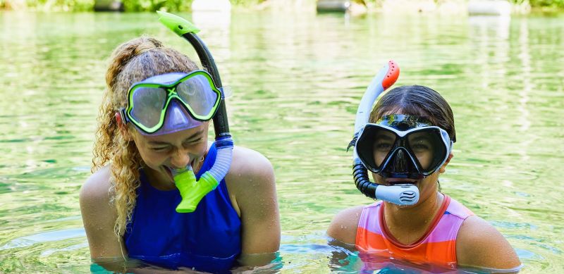 Father and daughter swimming
